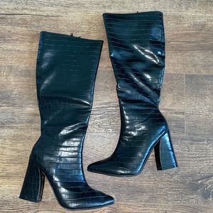 Knee high black boots